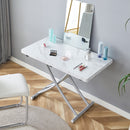 Modern minimalist multifunctional lift table with 0.8 inch thick MDF desktop and silver metal legs, can be used as a dressing table, coffee table, dining table, and office table.