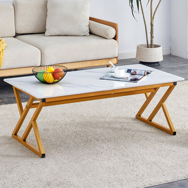 A coffee table made of rock slab material, with a smooth and natural surface that complements the modern design of the golden metal legs, making it suitable for living rooms .47*23.6 W1151P154282